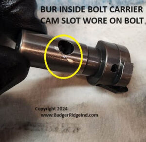 VersaMax Bolt with scar from burr in bolt carrier cam pin slot