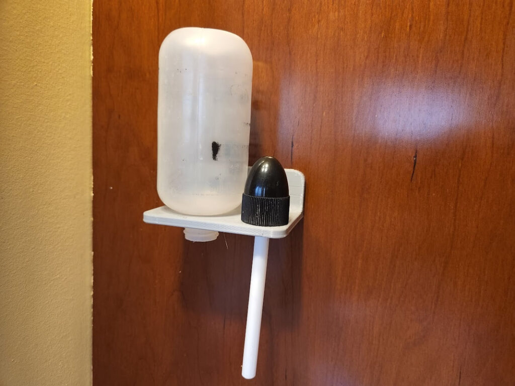 Neil Med holder shown with Bottle and Nozzle (not included)