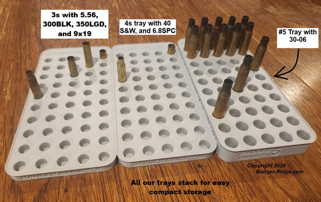 Reloading trays with brass, 3s, 4s, and 5