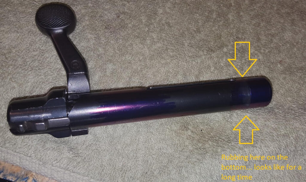 Rubbing on the front lower portion of the bolt